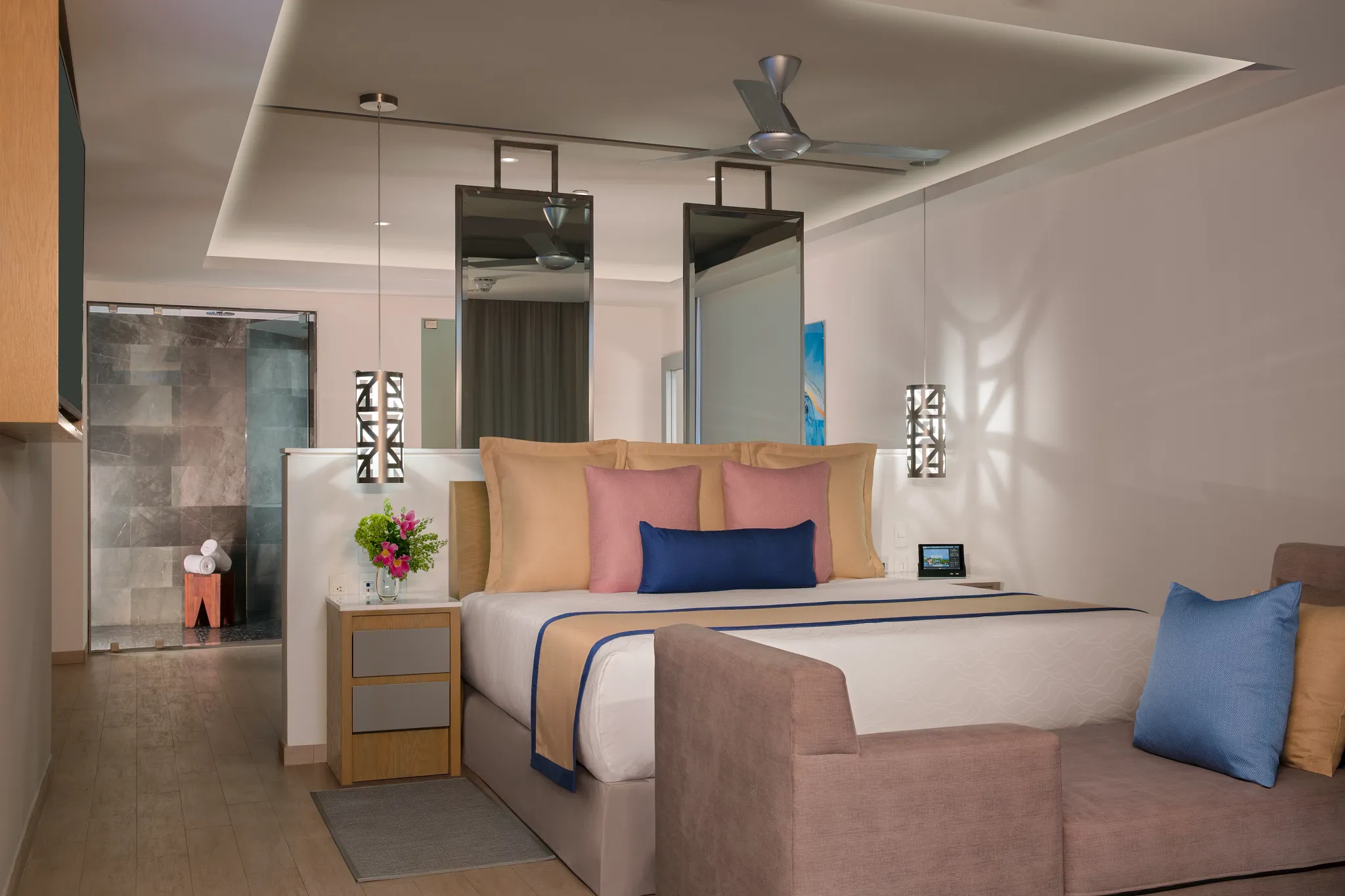 Preferred Club Presidential Suite Ocean Front bedroom with king bed at Secrets Riviera Cancun Resort & Spa.