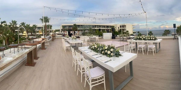 Purple Rooftop Lounge reception setup with ocean views at Secrets Riviera Cancun