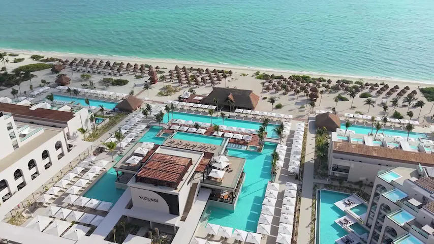 Excellence Playa Mujeres luxury adults-only all-inclusive resort with beachfront pools, modern suites, and upscale amenities near Cancun.