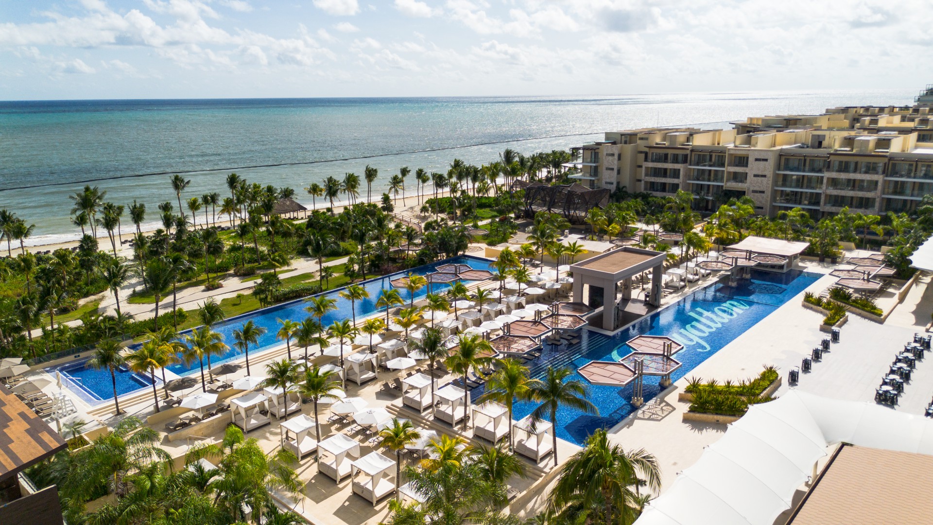 Royalton Riviera Cancun family-friendly all-inclusive resort with expansive pools, waterpark, and beachfront location near Puerto Morelos.