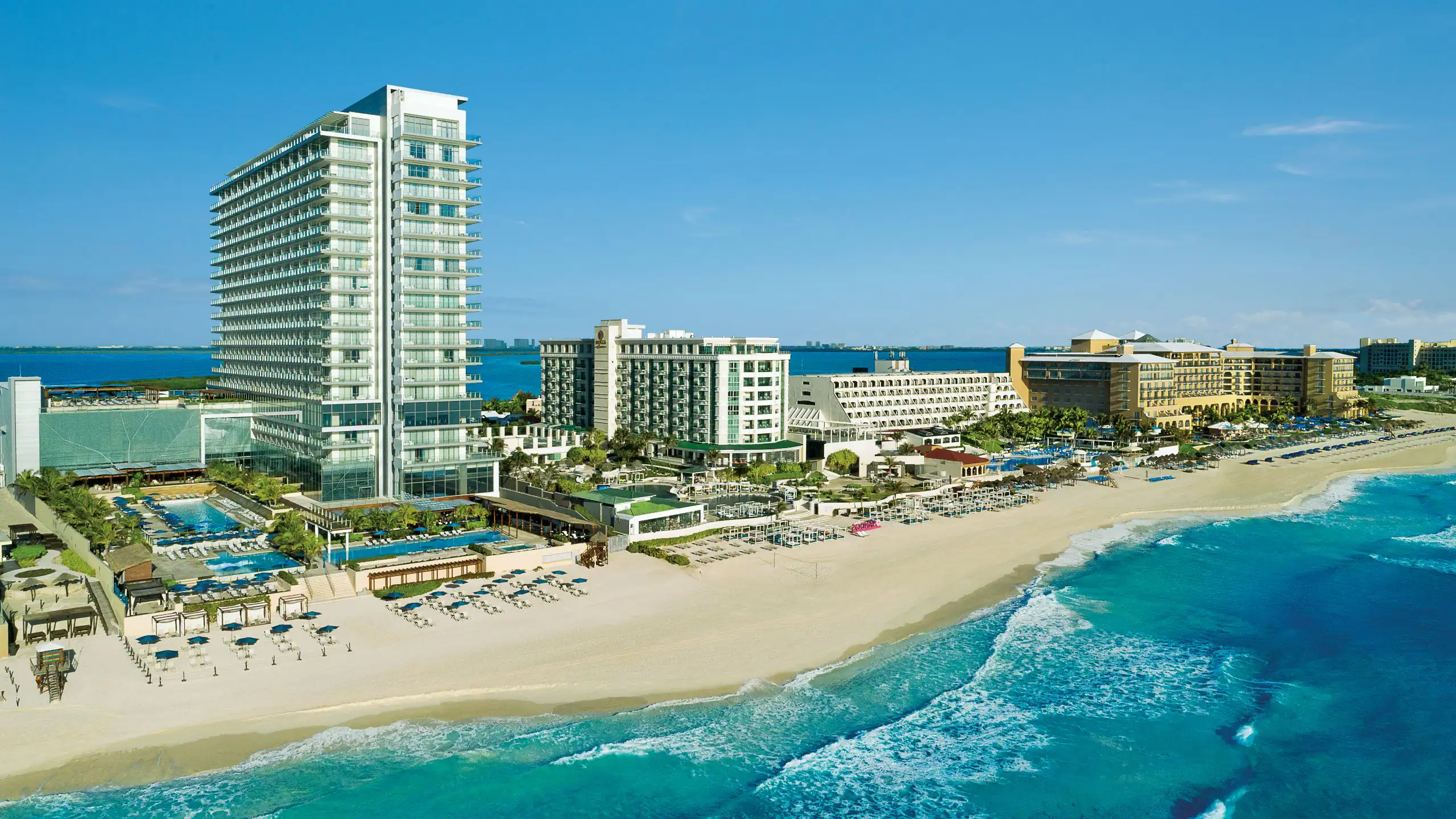 Secrets The Vine Cancun adults-only all-inclusive resort with modern architecture, rooftop pool, and Hotel Zone beachfront location.